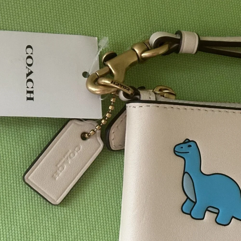 COACH STICKER PRINT WRISTLET:NWT CHALK/MULTI  GLOVETANNED LEATHER - Picture 9 of 10